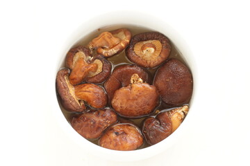 Shiitake mushroom soaked in water for cooking ingredient