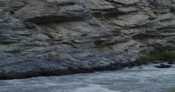Mountain river, seething with strong stream among the rocks