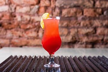 Tropical mixed fruit margaritas. cocktails drinks watermelon and orange at the bar.