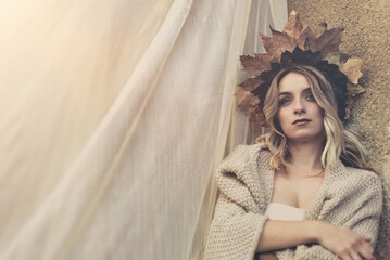 Autumn styled young woman with leaf crown