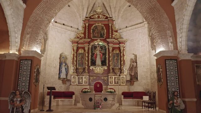 Inside Santa Barbara church in Santo Domingo, holy relic art in chapel arch, aerial