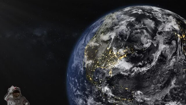 Animation of Earth seen from space, the globe spinning on satellite view on dark background. The city at night turns from night to day. (elements of this image furnished by nasa )