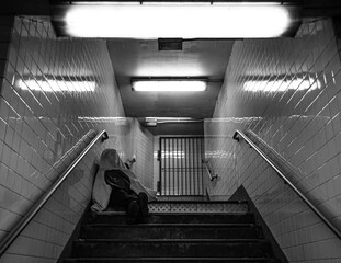 person on escalator