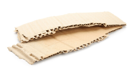 Pieces of cardboard on white background