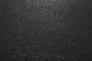 Dark black color old grunge wall concrete texture as background.