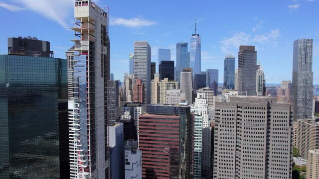 September 2021 - 4K aerial of lower Manhattan from the East River, NYC, USA