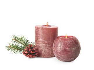 Composition with wax candles, fir branch and pine cone on white background