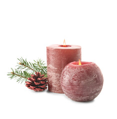 Composition with wax candles, fir branch and pine cone on white background