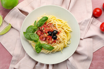 Plate with tasty Pasta Puttanesca, closeup