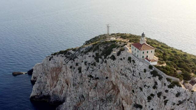 Susac Lighthouse On Cliff With Seascape - Susac Island Holiday Apartment In Croatia. - aerial