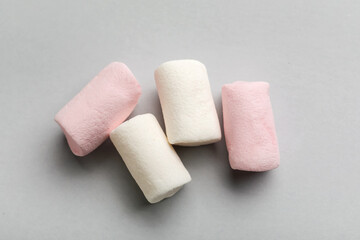 Sweet marshmallows on grey background