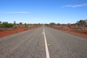 Fototapeta na wymiar Long straight road in the Pilbara region of Western Australia.