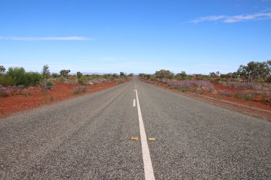 Long Straight Road In The Pilbara Region Of Western Australia.