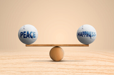 Peace and happiness on Ideal Balance Written on 3D Sphere stones scale. marble Stone with text. Wood Balance. wooden brown background 