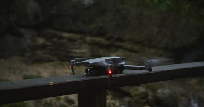 Taking off quadcopter. Modern technology for aerial photography.