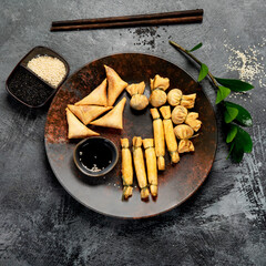 Different types of dumpilns on gray background.