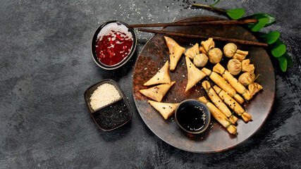 Different types of dumpilns on gray background.