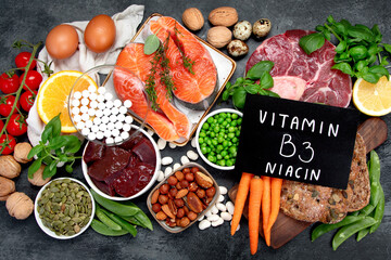 Food high in vitamin B3 on dark background.