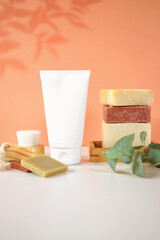 Cosmetic skincare container blank mockups in styled setting.