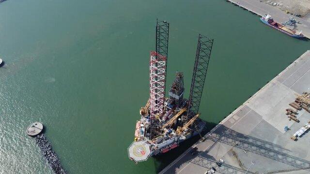 North Sea Oil Rig Platform At Great Yarmouth ,Norfolk UK Overhead Aerial 4K Footage Point Of View