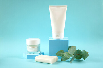 Cosmetic skincare container blank mockups in styled setting.