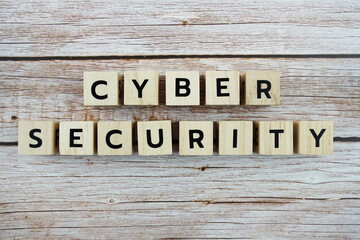 Cyber Security word alphabet letters on wooden background