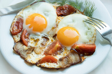 Scrambled eggs with lard and tomato Fresh fruit compote