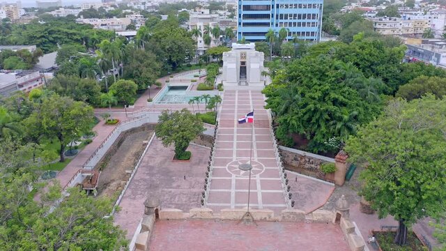 Aerial forward over Independence Park with Altar of Homeland in background, Santo Domingo
