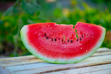 a slice of delicious watermelon is on the table