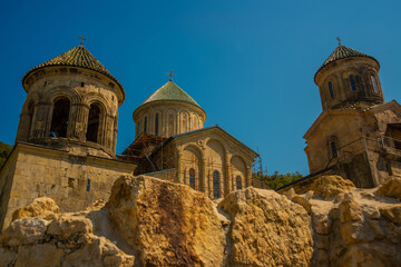 KUTAISI, GEORGIA: Landscape with a view of the Gelati Monastery on a sunny summer day in the background of the blue sky.