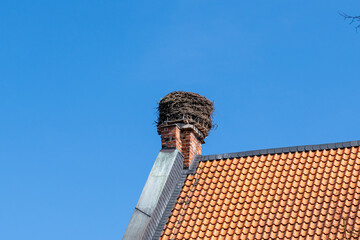 Stork nest on a chimney