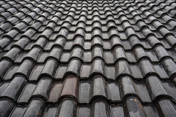 Black roof of the house tile arrangement