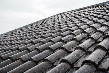 Black roof of the house tile arrangement