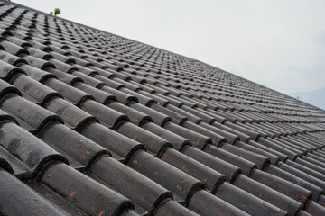 Black roof of the house tile arrangement