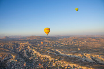 Balloon in the sky with people in Cappadocia