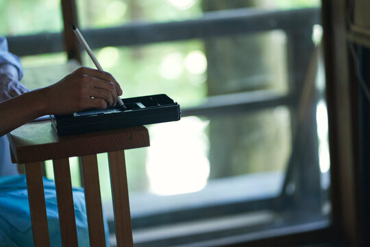 御朱印を書く神主