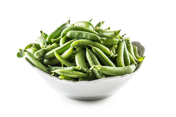 Fresh Green pea pods in white bowl isolated on white background