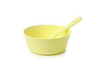 Plastic bowl with spoon isolated on white background