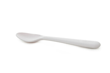 Single plastic spoon isolated on white background