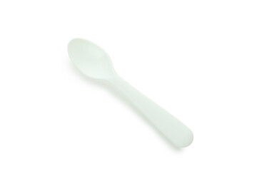 Single plastic spoon isolated on white background