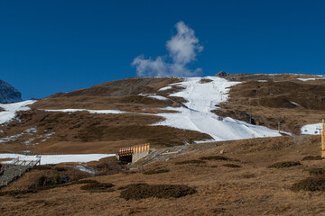 Ski slope prepared with artificial snow due to lack of precipitation