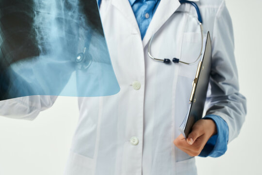 female doctor in white coat x-ray hospital health