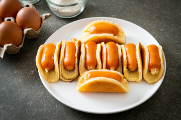 flat pancake roll with sausage