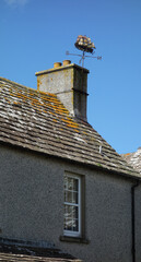 roof with chimney and a schooner decor for weathercock, Thurso, Scotland