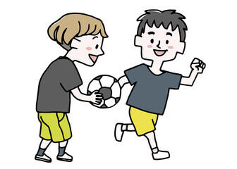 サッカーをしている二人の子供