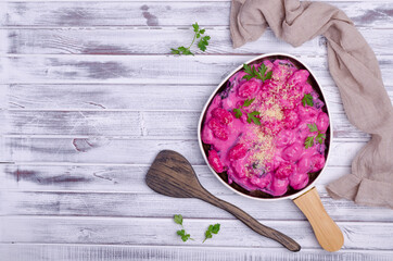 Gnocchi with cream beetroot sauce