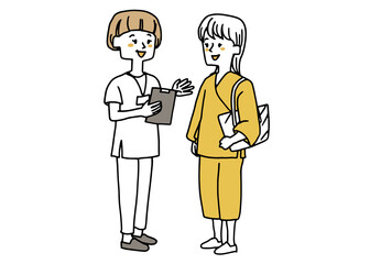 人間ドッグを受ける女性を案内するナース