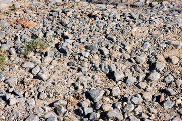 Gravel on an unpaved road in the countryside