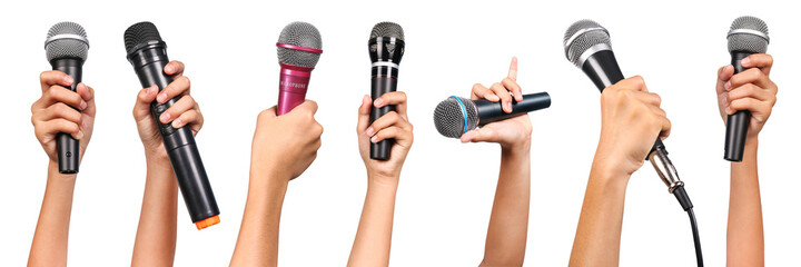 Set of woman hands holding microphones isolated on white background.