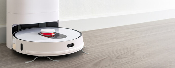 robotic vacuum cleaner on wood floor smart cleaning technology - obrazy, fototapety, plakaty